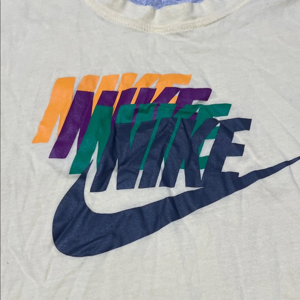 Nike‎ Yellow Tee with Multicolor Logo.  CAJA. # 1. D